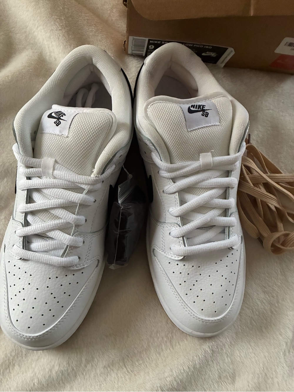 The Nike SB Dunk Low Orange Label White Black (2019) size 9